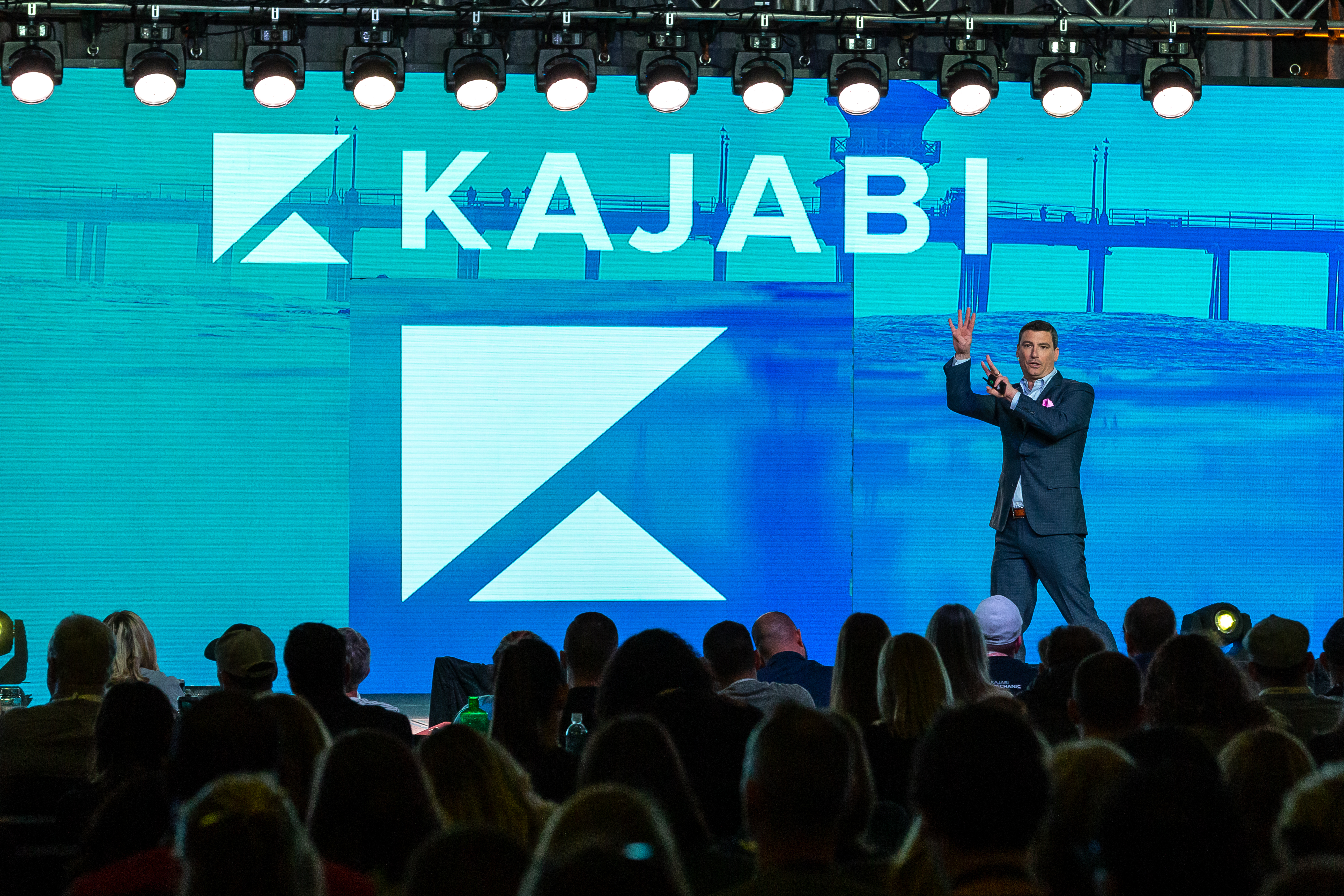 Russ Henneberry speaking at the Kajabi conference